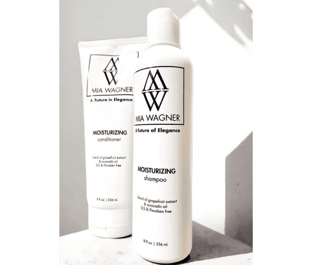 Mia Wagner brand moisturizing shampoo and conditioner bottles.